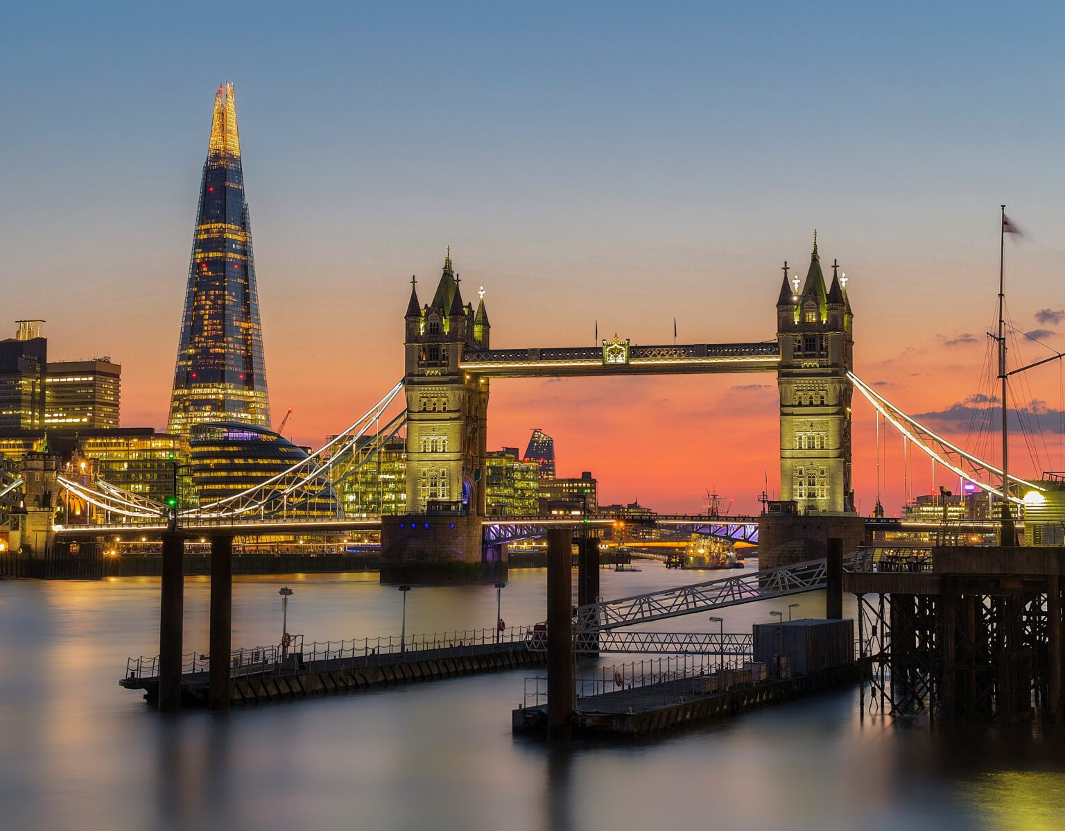 Tower Bridge with The Shard skyline at sunset in London UK