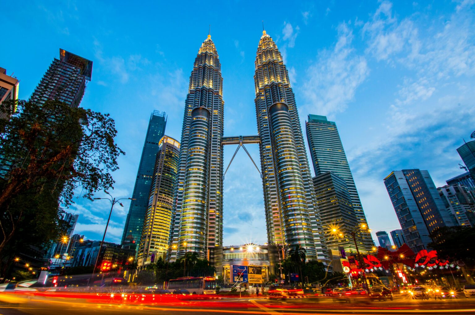 Malaysia destination guide featuring the Petronas Twin Towers in Kuala Lumpur.