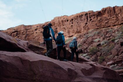 Hiking trails in Sedona shown by red rock formations under a clear blue desert sky