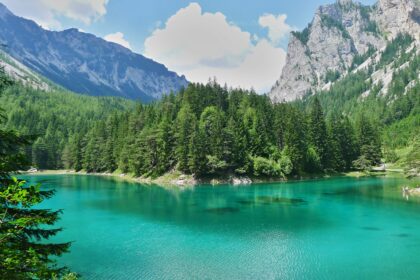 Best places to travel in May shown by a warm sunny coastline in southern Europe