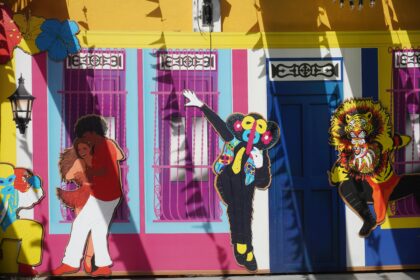 Barranquilla Carnival mural with marimonda and dancers